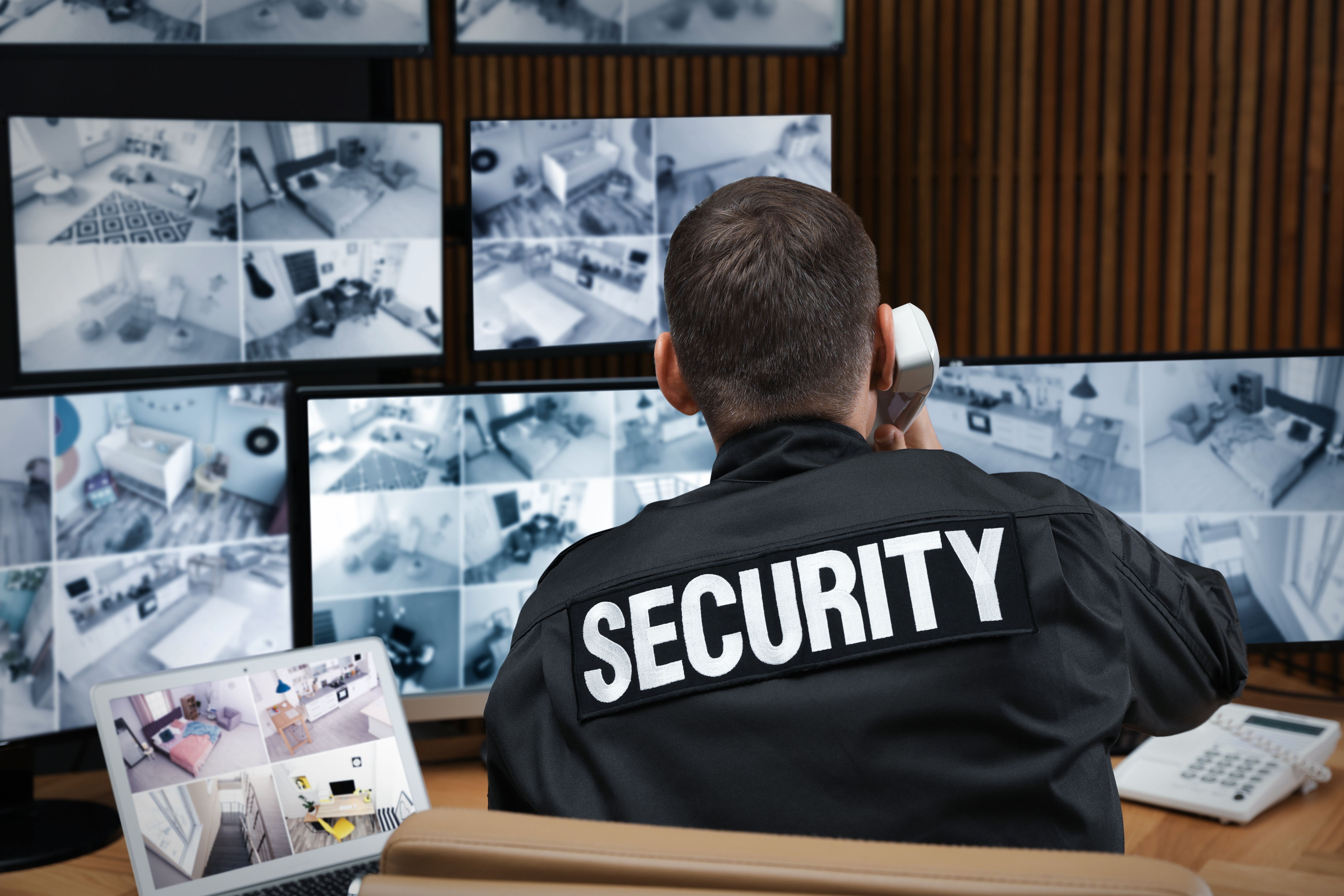 Professional security team with drone surveillance